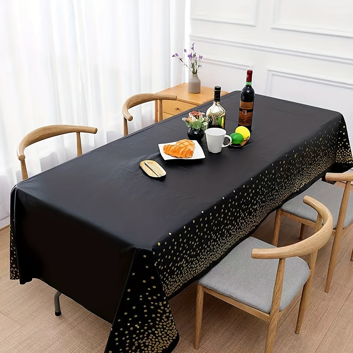 Disposable golden dot waterproof tablecloth, 137x274cm, for parties and events.