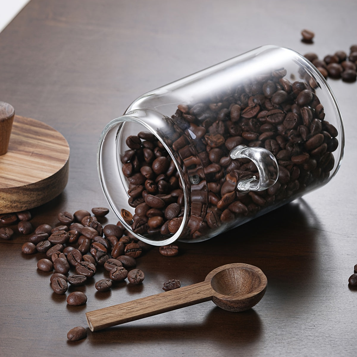 Glass containers for storing coffee, tea, grains, snacks, and pickles.