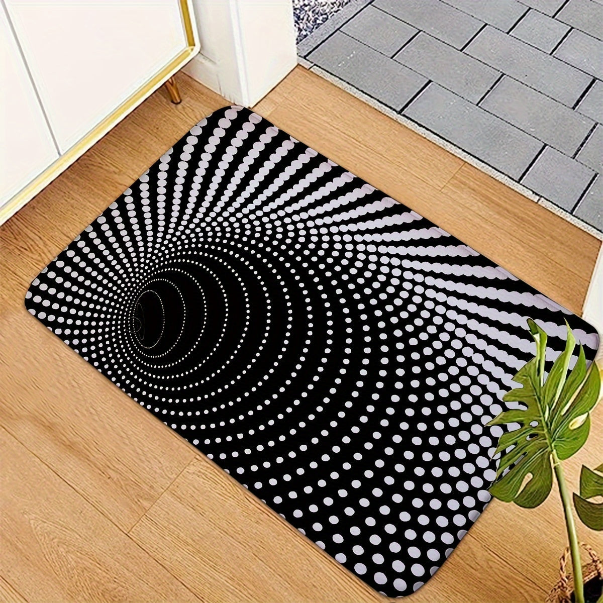 Soft and comfortable, this rectangular welcome mat features a 3D Illusion Black Hole pattern on flannel material. It is non-slip, machine washable, and suitable for both indoor and outdoor entrances and hallways.