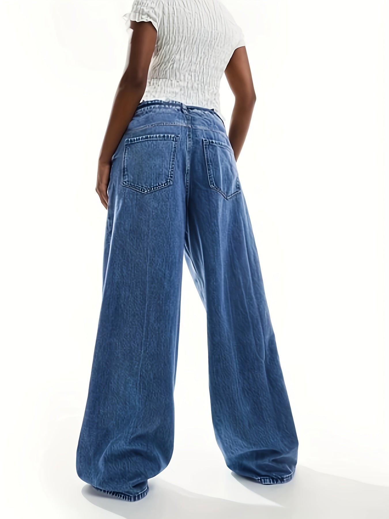 Plus Size High-Rise Wide Leg Denim Jeans in Casual Light Blue. Comfortable, adjustable waistband for all seasons. Casual, relaxed style in a rayon blend.