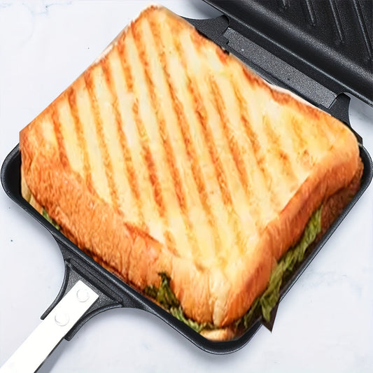 Hot sandwich maker for both gas and induction stoves, featuring non-stick plates. This stovetop toasted sandwich maker comes with a dismountable flip pan for home kitchen use. The black design makes it suitable for outdoor, camping, and kitchen use as a