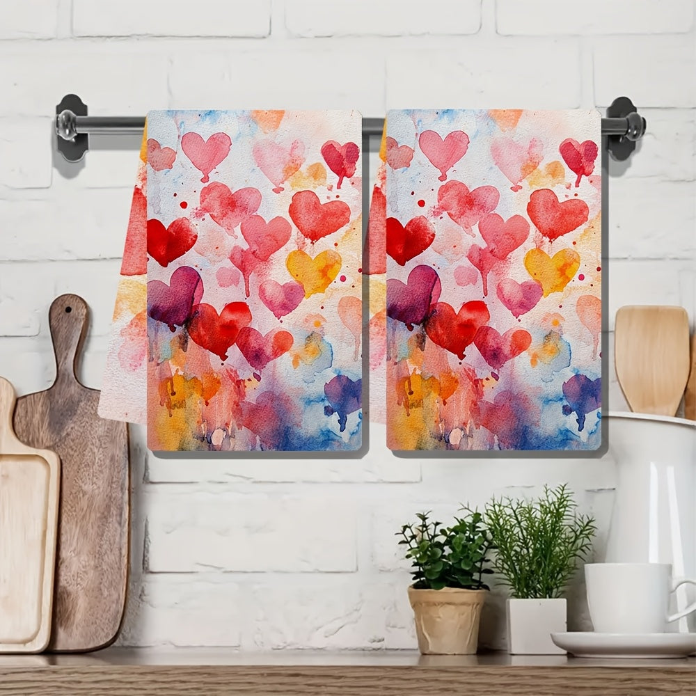 Set of 2 Ultra Soft Kitchen Towels featuring a Valentine's Day Heart Splash Design. These towels are highly absorbent, machine washable and measure 40.64x60.96 cm. They have vibrant watercolor hearts perfect for adding a festive touch to your home decor.