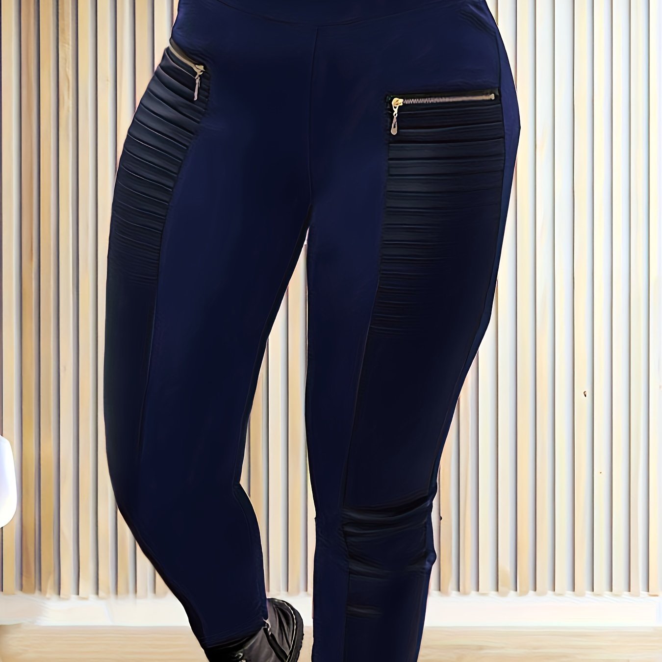 Plus size black tapered pants with golden zipper detail, high waist, stretchy polyester, casual solid color, machine washable, all-season comfort, flexible fashion, and sleek fabric.