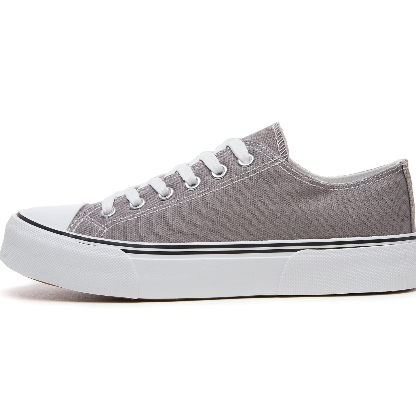 Women's casual canvas sneakers in solid color with plain toe, rubber lace-up design, machine washable fabric, and lightweight rubber sole. Suitable for all seasons.