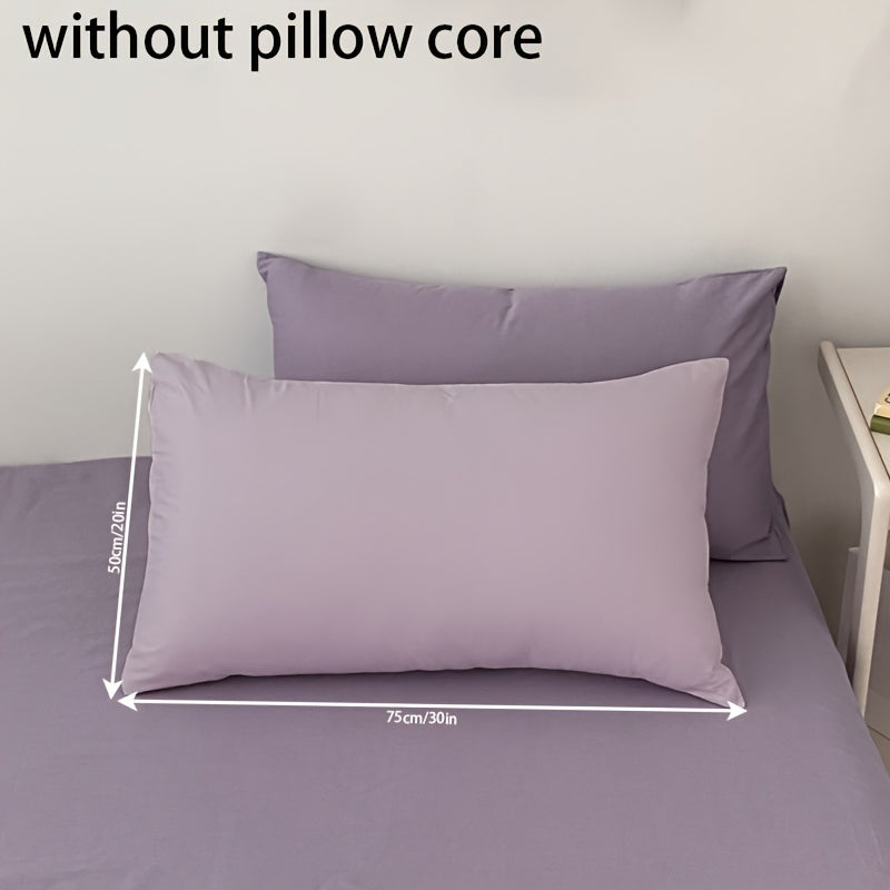 Get two ultra-soft brushed polyester pillowcases, weighing 90g each in a sleek light purple color. These rectangular pillowcases measure 50.8x76.2cm and feature an envelope closure. They are machine washable and perfect for adding cozy comfort to your