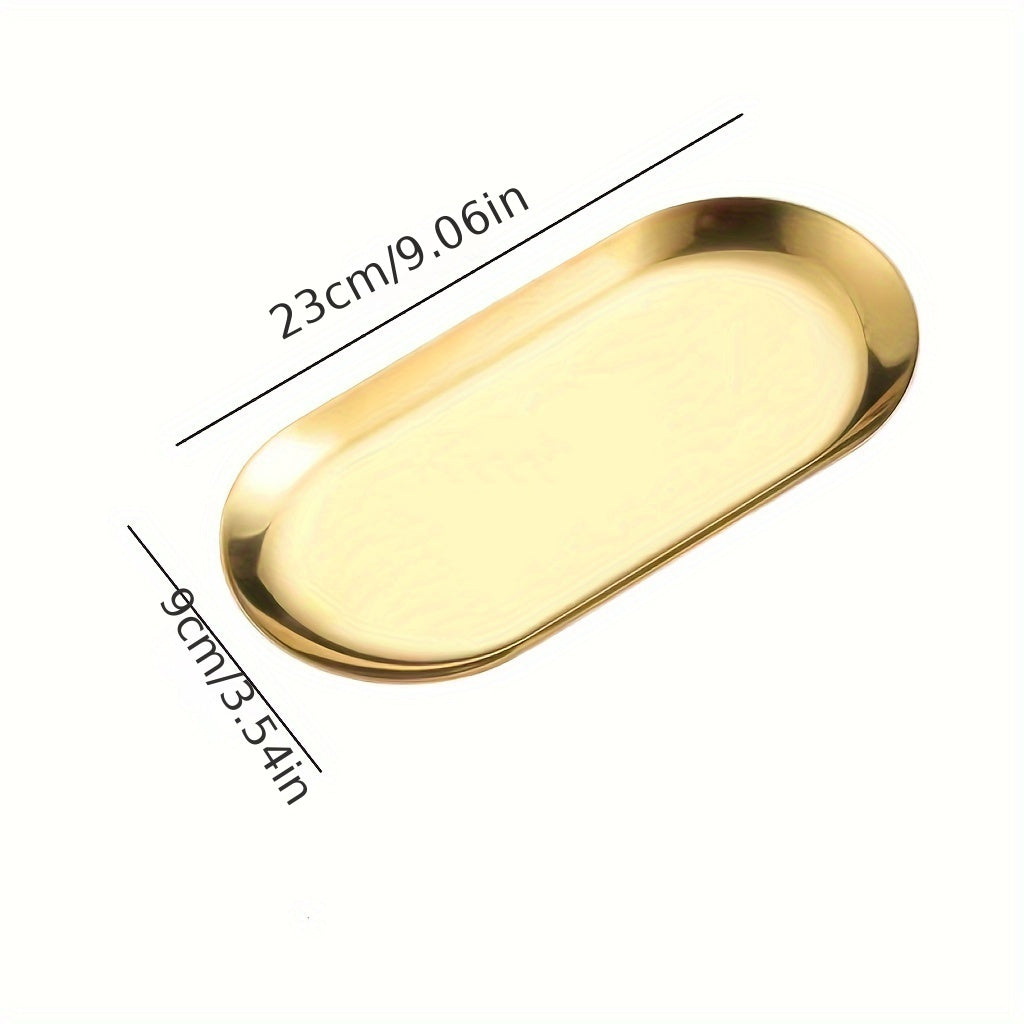 Stainless steel oval tray for jewelry, toiletries, or serving dim sum.