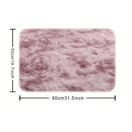 Luxuriously soft and cozy tie-dye gradient area rug - Ideal for bedroom, living room, or coffee table - Made from machine washable polyester fiber, with long plush for added comfort - Perfect for adding a touch of style to your sofa.