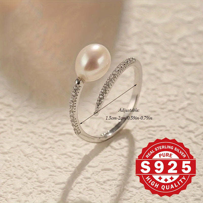 This elegant freshwater pearl ring for women is crafted from S925 sterling silver and adorned with artificial zirconia and freshwater pearls. Its stylish clash design makes it a unique gift option for festivals. Suitable for all occasions, this