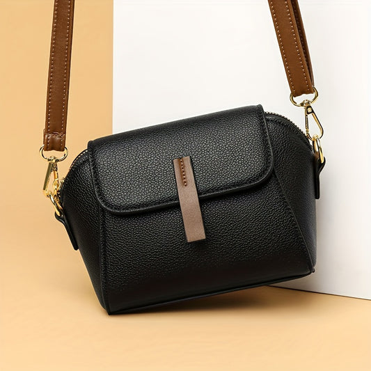 Stylish women's crossbody bag made of PU leather for daily use, measuring 7.1 x 5.1 x 3.5 inches.