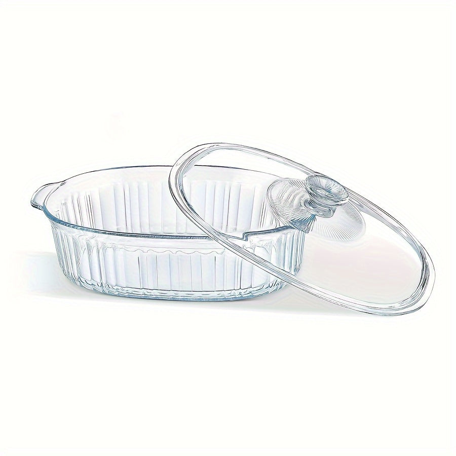 Oval clear glass casserole dish with lid and handles, versatile for microwave, oven, and dishwasher use - ideal for preparing fish, salads, and pasta.