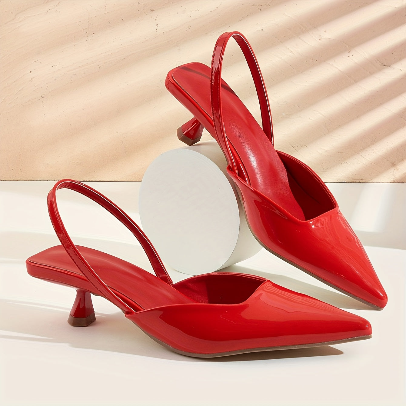 Lightweight women's kitten heel pumps with elegant design, pointed toe, ankle strap, and faux cover in various colors. Versatile for all seasons.