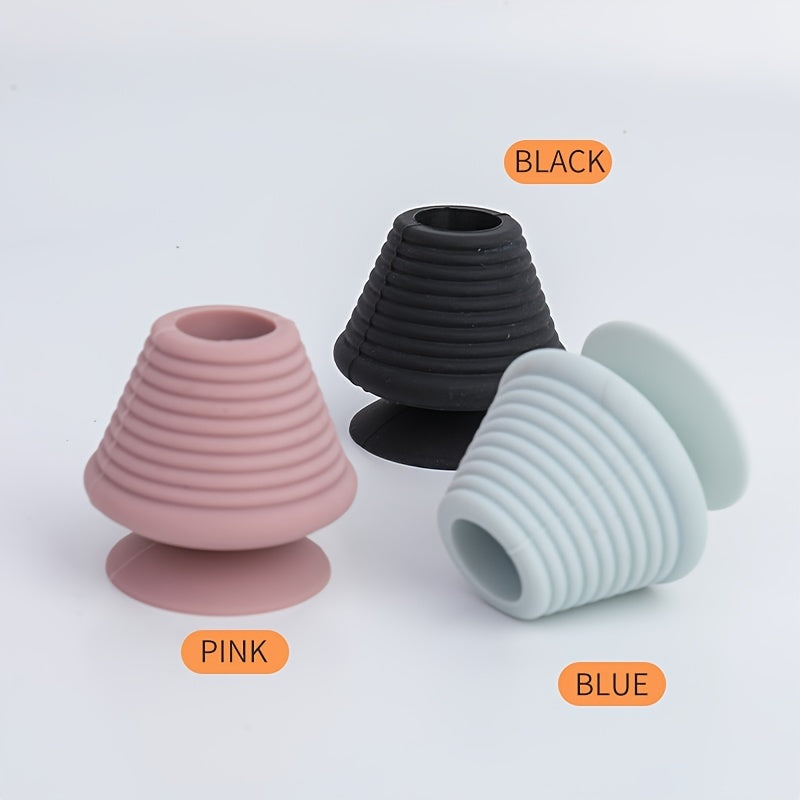 Universal silicone rubber plug with suction cup for kitchen, bathroom, and household drains.