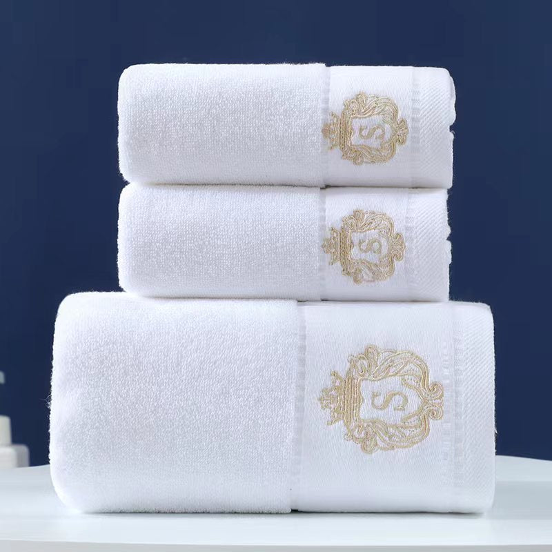 3-piece ultra soft absorbent bath towel set for home and hotel use, consisting of 1 bath towel and 2 hand towels. Made of cotton, the large white towels measure 71.12x139.7cm and serve as essential bathroom accessories for travel.