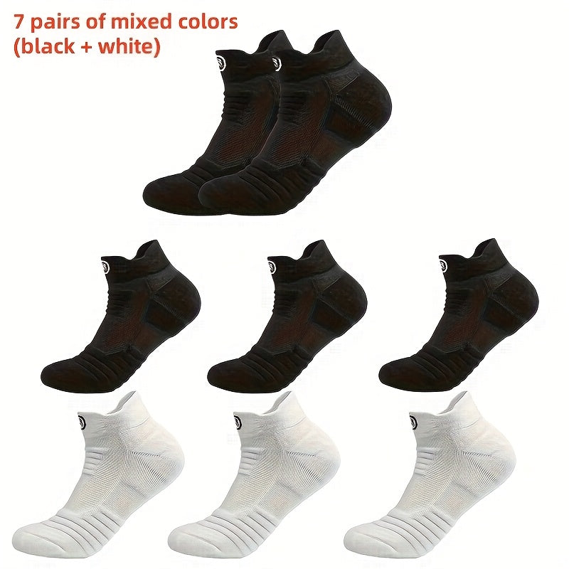 5 pairs of high-performance athletic compression socks for men in gray, black, and white. Made with breathable polyester and sweat-wicking material with a towel bottom, featuring a