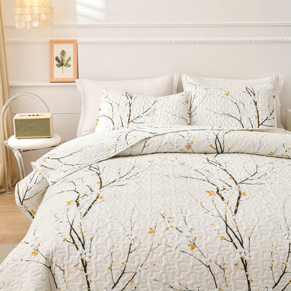 Elegant Plum Blossom Quilt Set includes 3 pieces (1 Quilt + 2 Pillowcases, Core not included). Made with skin-friendly, soft and breathable materials, this bedding is warm and comfortable for all seasons. Perfect for hotel or bedroom use.