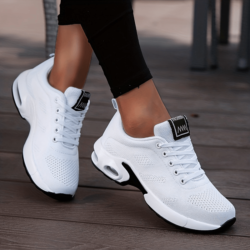 The women's sneakers are shock-absorbing and comfortable for outdoor sports with an air cushion and lace-up design.