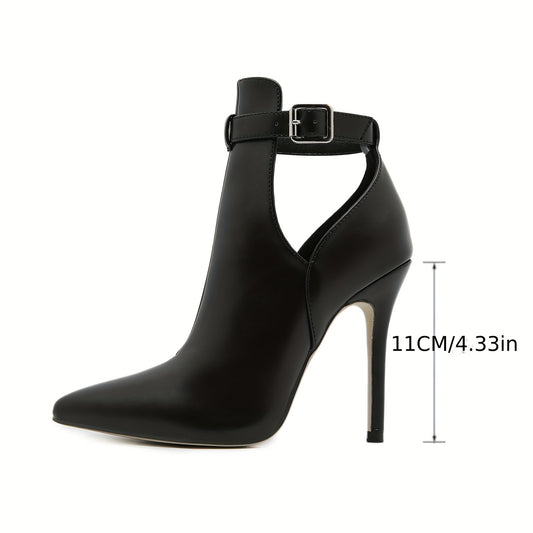 Stylish ankle bootie with buckle closure, pointed toe stiletto heel, rubber sole, and fabric insole. Made in Huizhou.