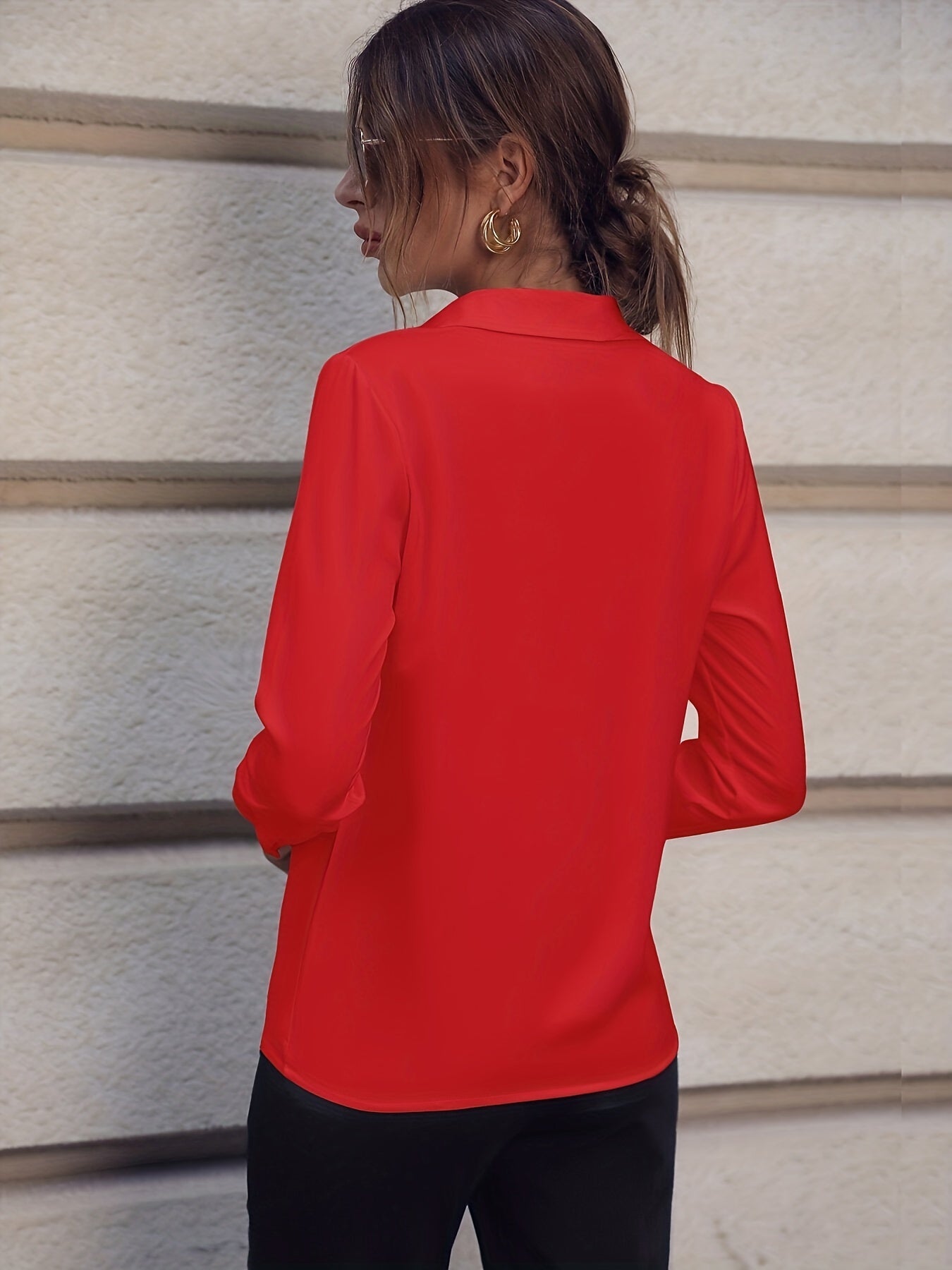 Stylish long-sleeve blouse with pearl buttons - slim fit, solid color for women, ideal for casual or office wear.