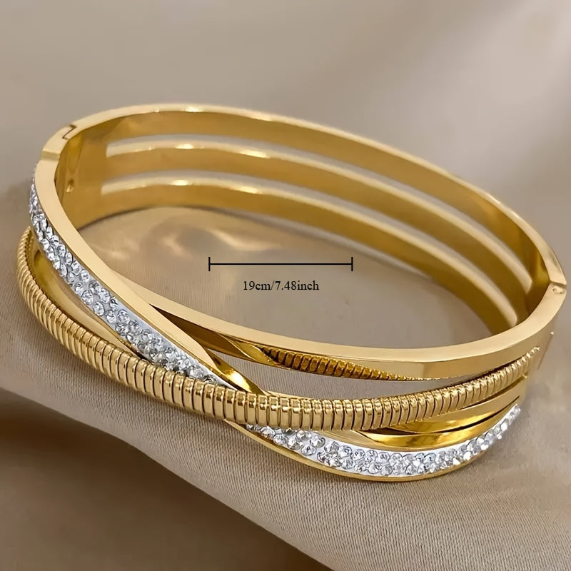 Simple and elegant, this beautiful triple-strand bracelet is plated with 18K golden stainless steel and adorned with synthetic cubic zirconia stones. Perfect for everyday wear or vacations, its classic style is versatile and timeless.