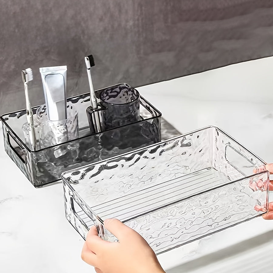 Clear water ripple plastic storage basket perfect for organizing makeup, skincare, snacks, and bathroom accessories. Ideal for back to school and dorm essentials.