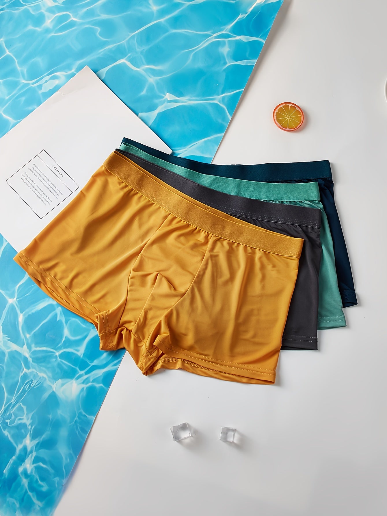 4 men's silk boxer shorts that are cool and breathable.