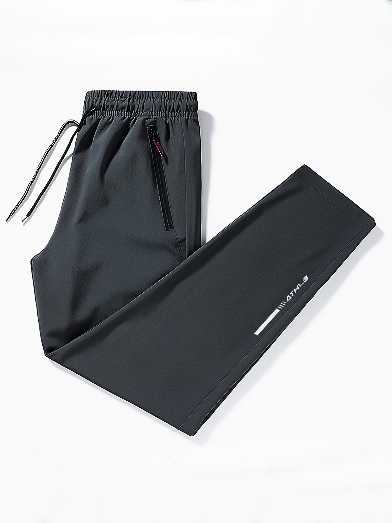 Men's track pants with zipper pockets for outdoor activities gifted.