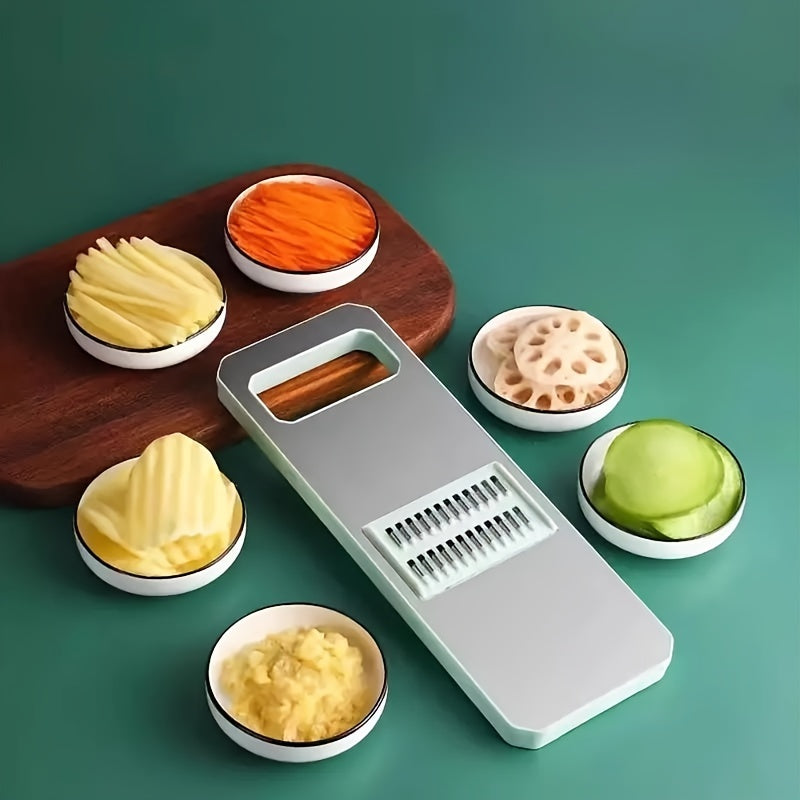 A set of 7 stainless steel tools that can slice and grate vegetables, with interchangeable blades. This manual kitchen gadget is perfect for preparing potatoes, carrots, and cucumbers.