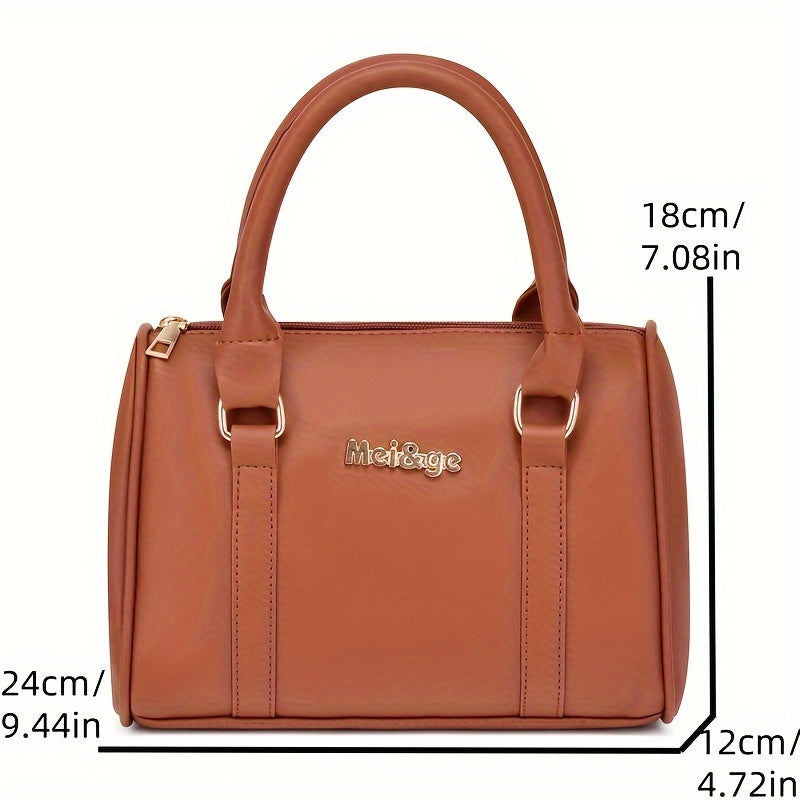 Large cross-body bag for mothers made of PU material with six compartments.