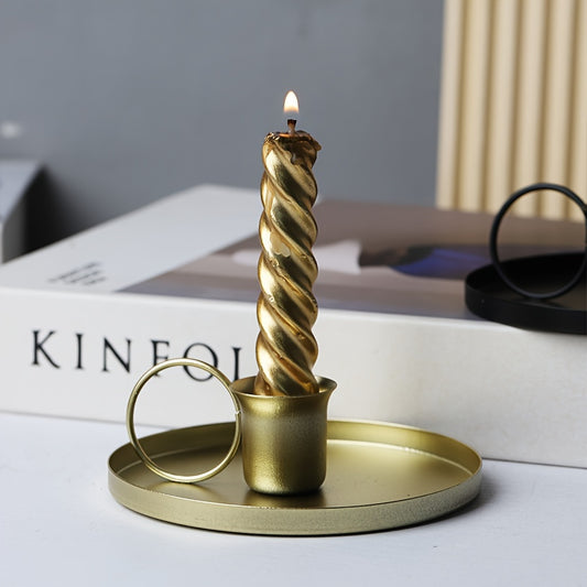 Stylish metal candle holder for table decor at home, ideal for dinner parties and special occasions.