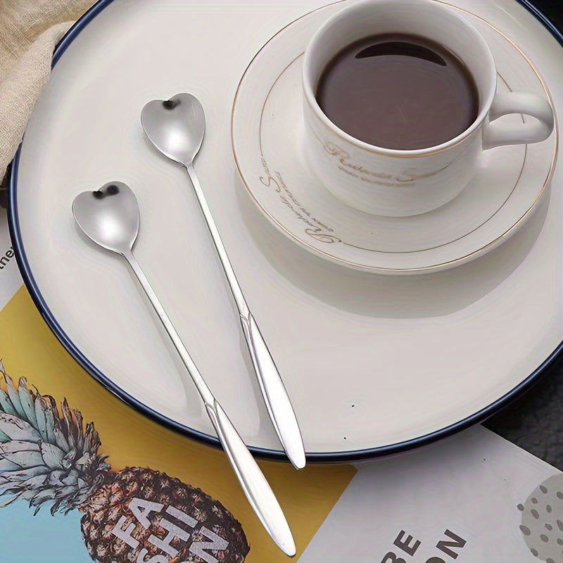 Set of 8 adorable heart-shaped coffee spoons, with a shiny mirror finish and long handles. Made of stainless steel, suitable for stirring drinks, desserts, and cocktails. Ideal as a gift for a loved one, perfect for tea parties, coffee bars, weddings