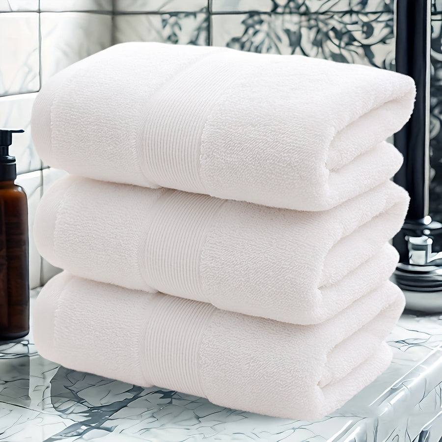 3 premium cotton velvet towels, 35.56cm x 73.66cm, soft & absorbent, hotel quality in dark blue, light beige, and gray. Ideal for bathroom or spa use.