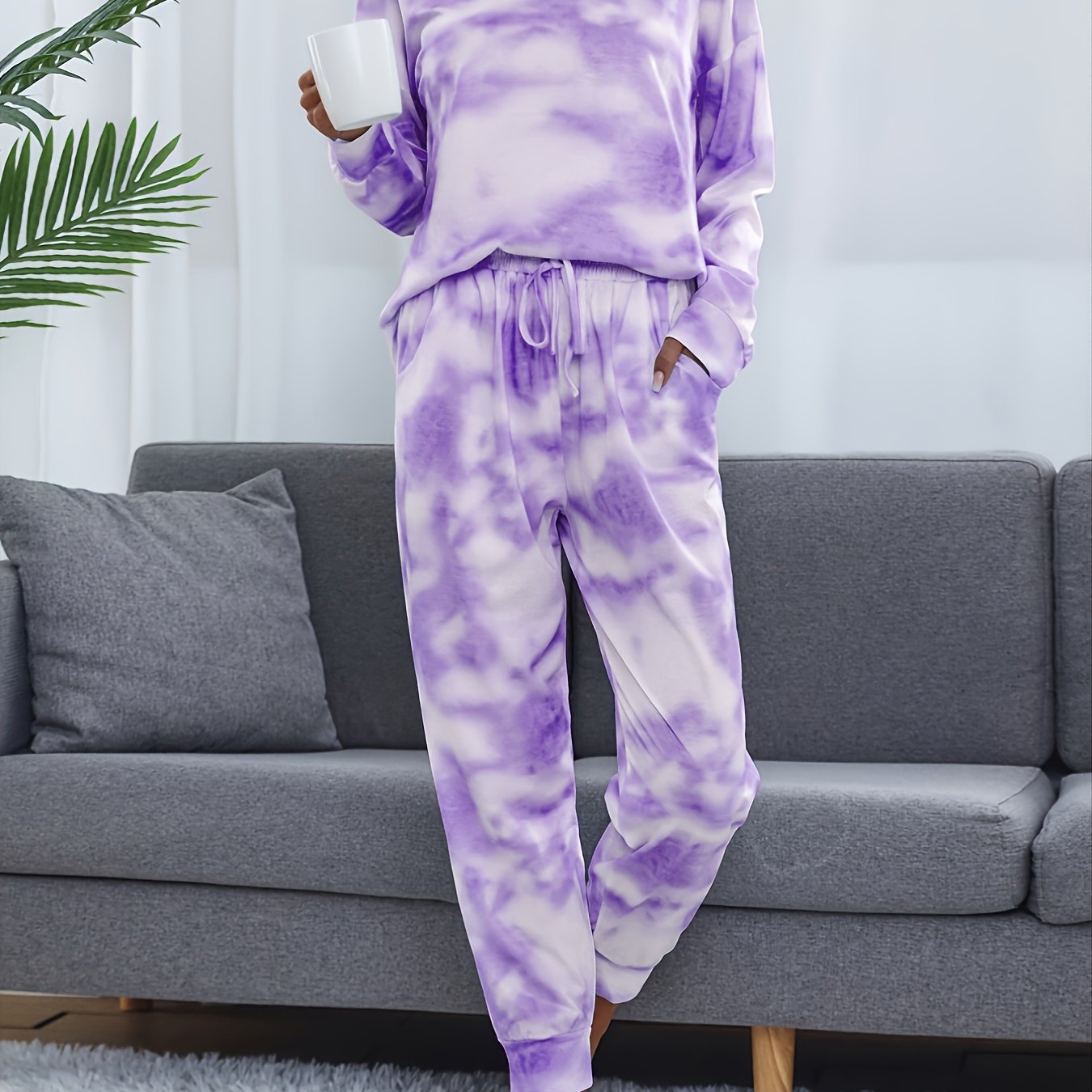 Tie dye lounge set for women, with long sleeve top and elastic waistband pants.