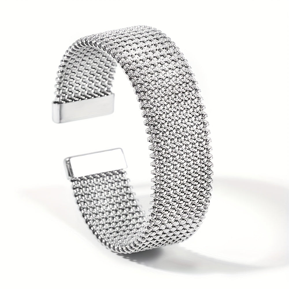 Stylish woven stainless steel bracelet with a golden touch, versatile accessory in trendy golden tone.