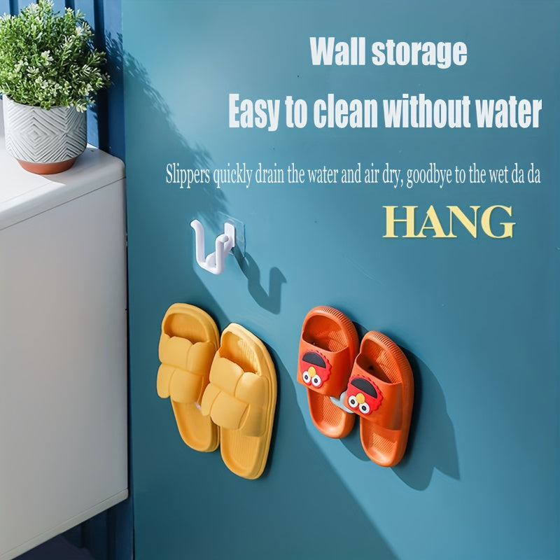 Wall-mounted slipper holder for bathroom made of non-porous plastic. Requires no batteries, easy to clean, and saves space with a single shelf design.