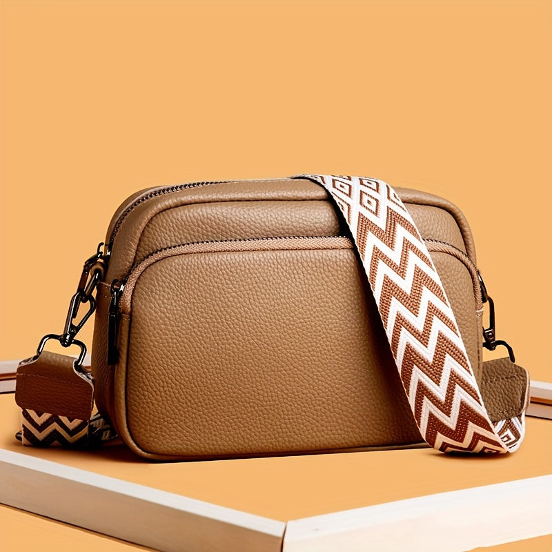 Women's stylish crossbody bag in deep brown, cream white, or black. Features zipper closure and polyester lining.