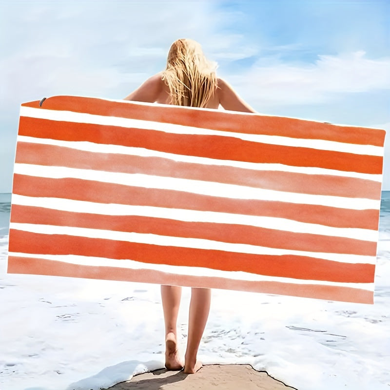 Oversized striped beach towel perfect for adventures. Made of super soft microfiber, quick-dry, sand-free, and ideal for various activities. Available in tropical blue & white. Comes in two sizes and is lightweight and absorbent.