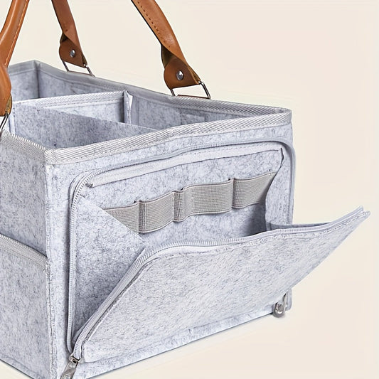 Spacious Light Grey Mommy Diaper Bag with Zipper Closure, Foldable Design and Ample Storage Capacity