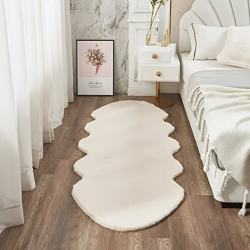 Pamper your space with this gorgeous Faux Rabbit Fur Area Rug, known for its luxurious softness and plush feel. This stain-resistant beauty is perfect for enhancing the decor of your bedroom or living room. Its unique shape adds style to any room, but