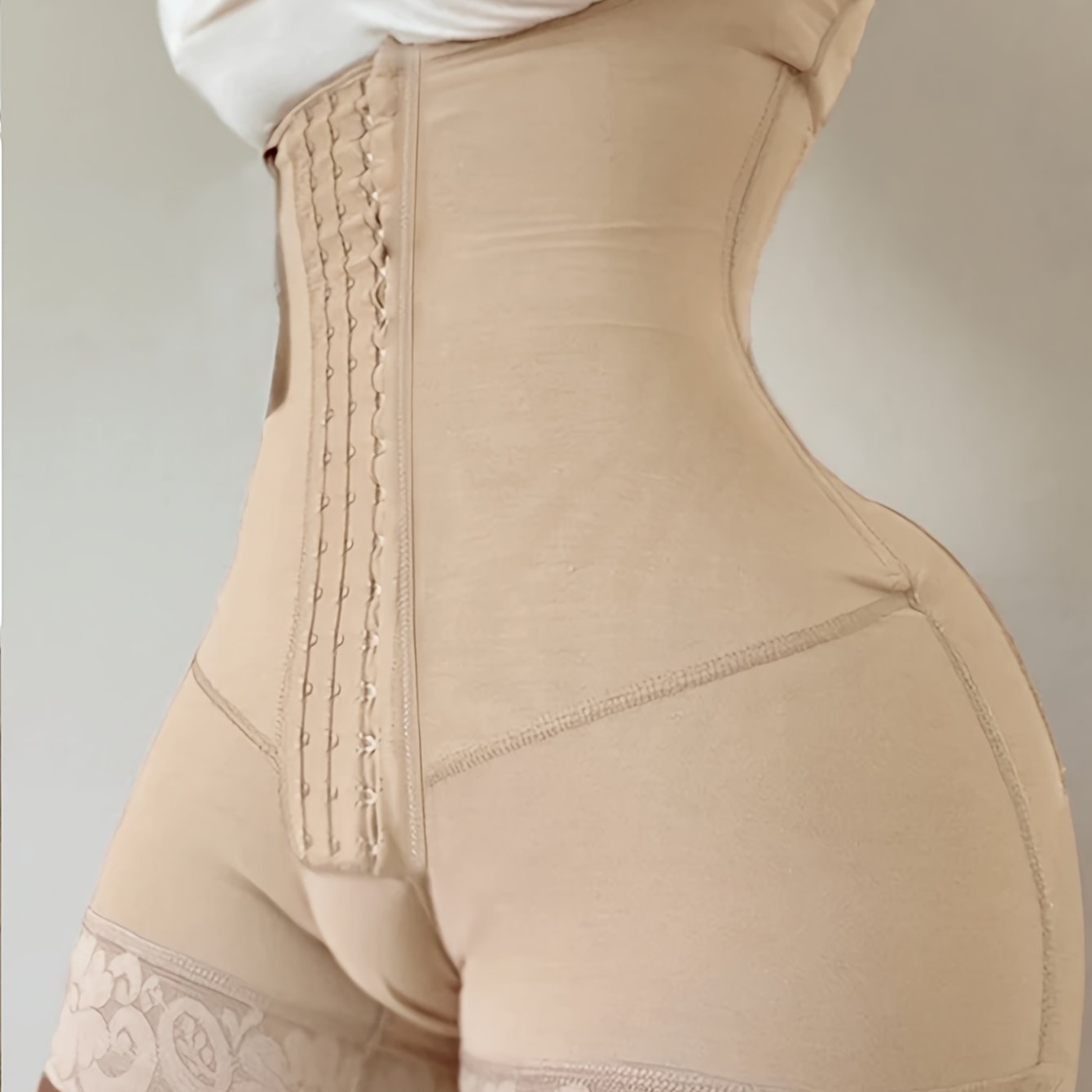 Nylon bodysuit with 4-row hook, postpartum tummy control, waist cincher, full coverage, lace detail, solid color, mid-support, knit fabric, suitable for daily or evening wear.