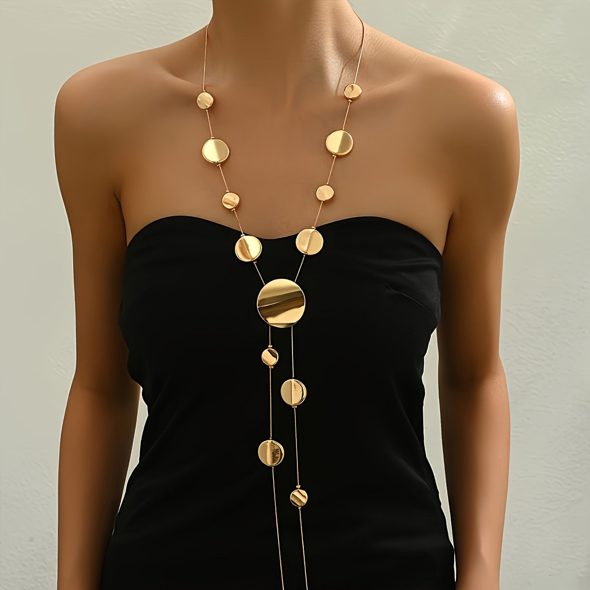 Stylish Long Y-Shaped Necklace in Elegant Golden Tones with Geometric Round Beads - Effortlessly Chic and Fashionable, Ideal for Everyday Wear.