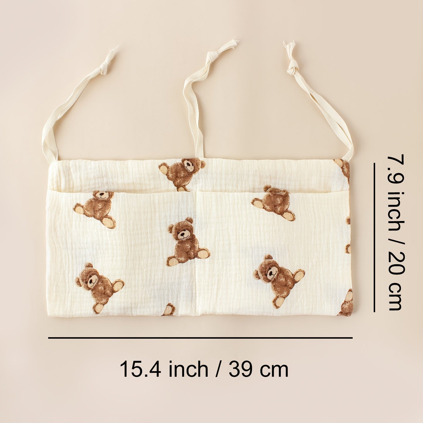 Double-layer fabric hanging storage bag with two stroller pockets, ideal for holding baby bottles with printed patterns.