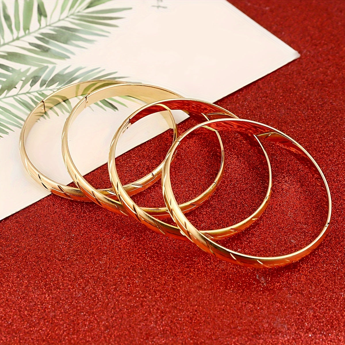 Set of 4 Bohemian African Style Women's Fashion Bangle Set, Copper Plated with Golden Finish. Great for Engagements, Weddings, Parties, and as a Gift. Suitable for All Seasons and Particularly Perfect for Lunar New Year Celebrations.