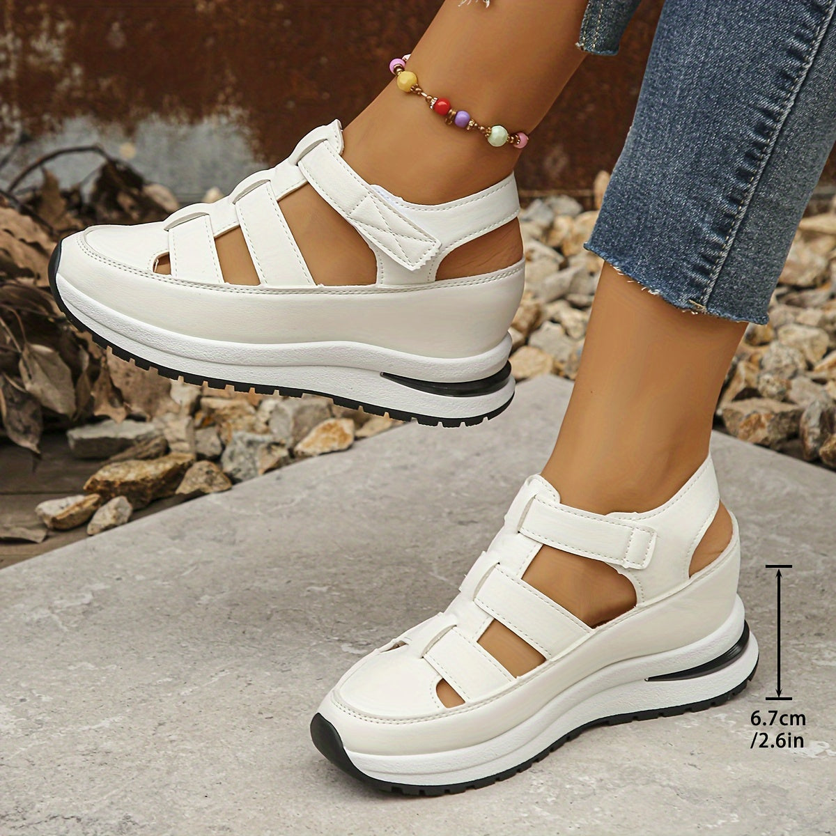 Soft sole platform sandals with round toe, comfortable for casual walking. Hollow wedge design for breathability.