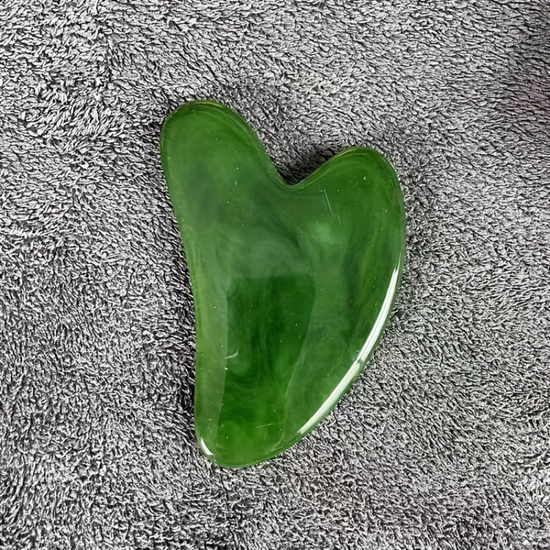 Heart-shaped resin Gua Sha tool for facial and full body hair removal, high-quality for beauty salon use.