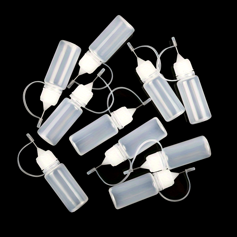 10-pack 10ml empty plastic glue applicator bottles with needle tip, suitable for DIY crafting and storage of paint, glue, ink, and other liquids. Perfect for quilting projects.