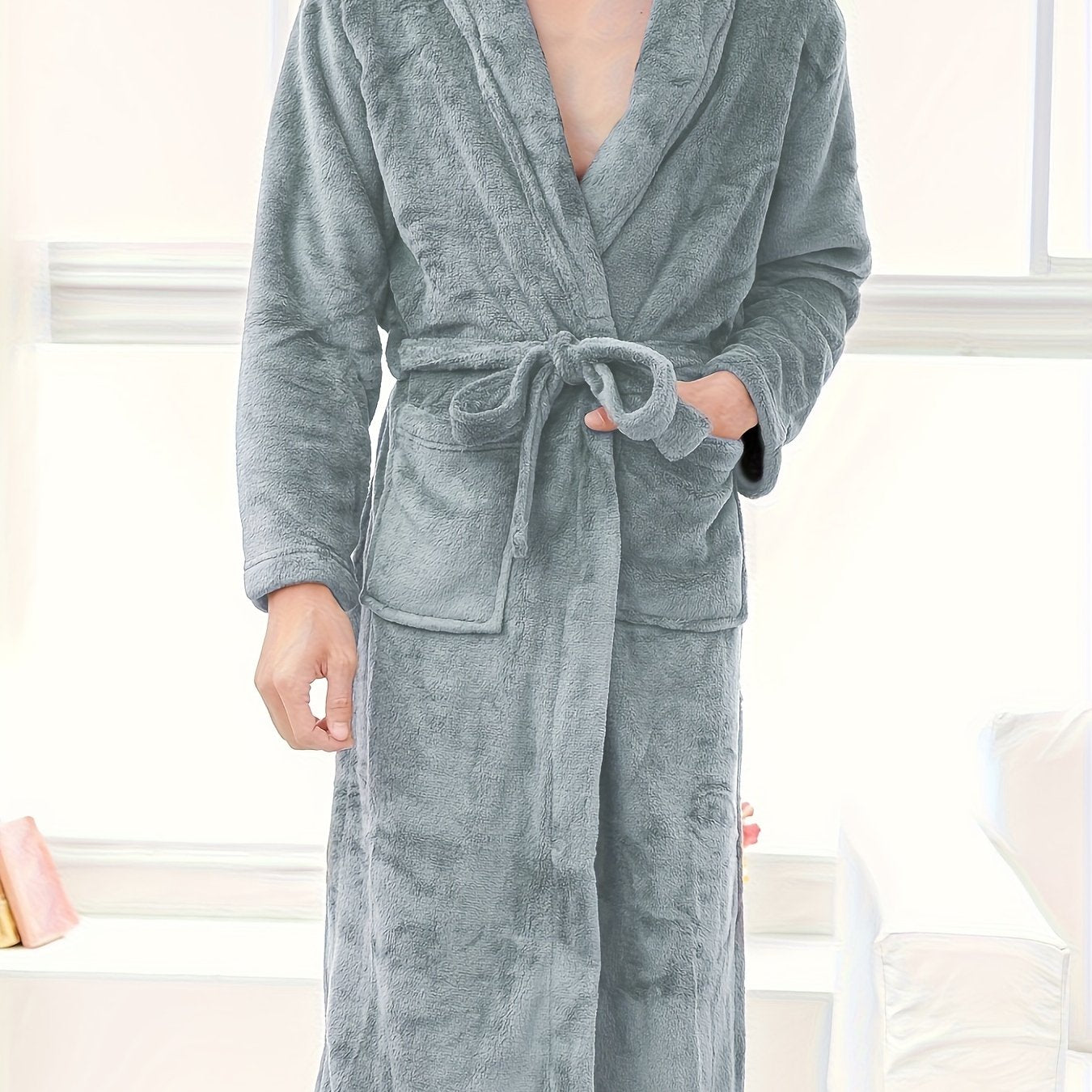 Men's cozy fleece robe with pockets, perfect for relaxing at home.