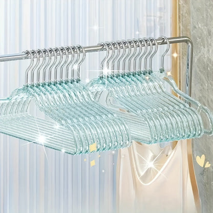 A set of 12 premium acrylic hangers with a non-slip, sparkling transparent design, providing a firm grip for wardrobe storage. These durable, thick hangers are perfect for bedroom closets, offering a traceless hanging solution.