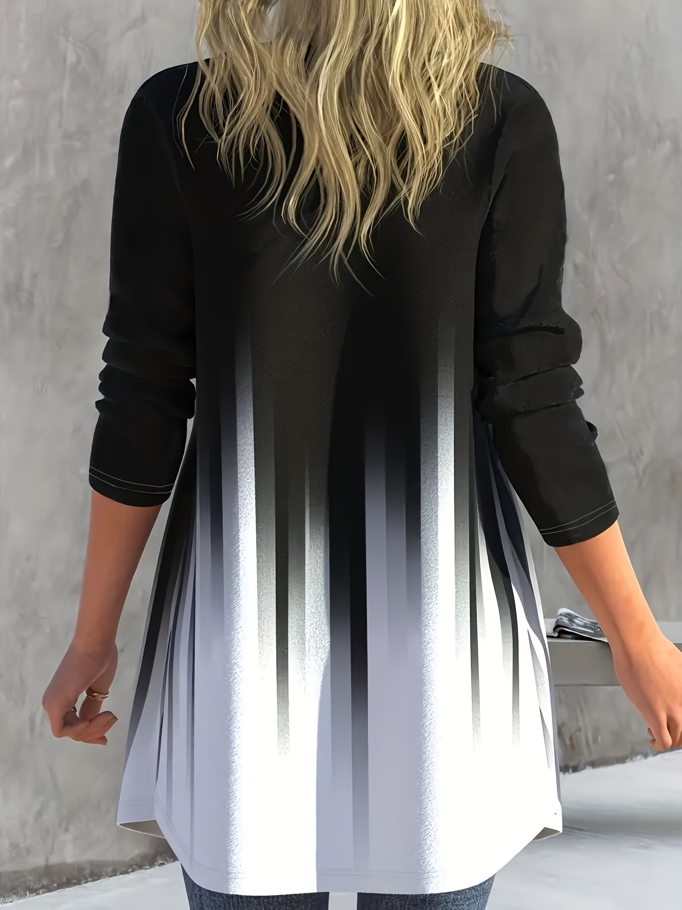 Elegant black to white ombre cardigan for plus size women. Features long sleeves, asymmetric hem, and lightweight polyester blend. Machine washable.