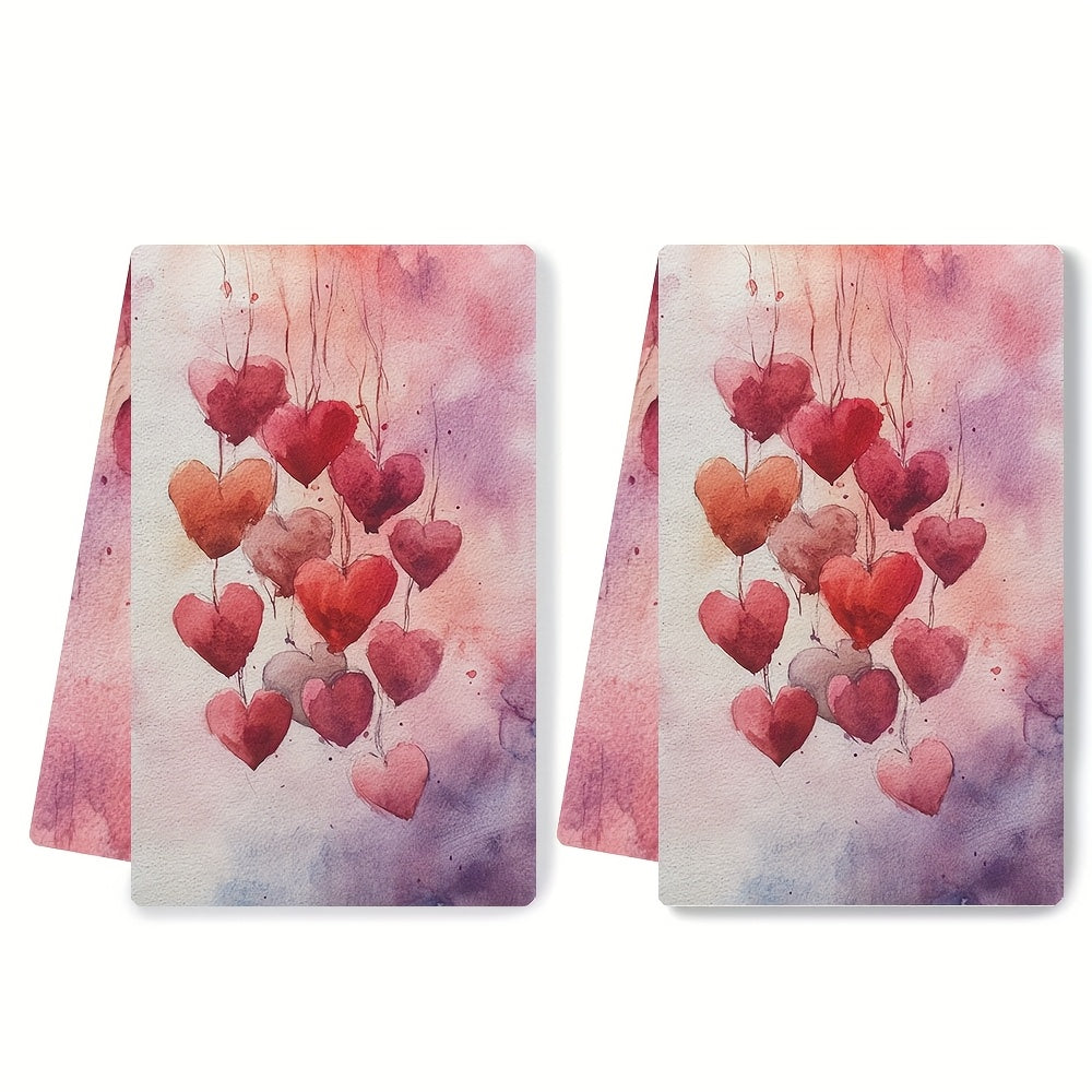 2 pieces of ultra soft kitchen towels featuring a Valentine's Day heart design. These highly absorbent and machine washable dish hand towels showcase romantic pastel hearts with balloons. Each towel measures 40.64x60.96 cm, making them perfect for