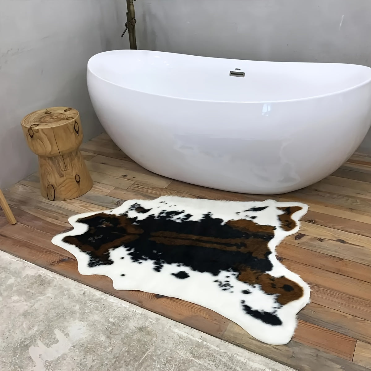 Add a touch of luxury to your space with our 1pc Premium Faux Cowhide Rug. This durable and large size cow print rug is perfect for your bedroom or living room. Made of faux fur, this animal cow hide carpet is easy to maintain with hand washing only.